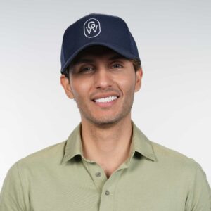 Man wearing a blue GroWell cap