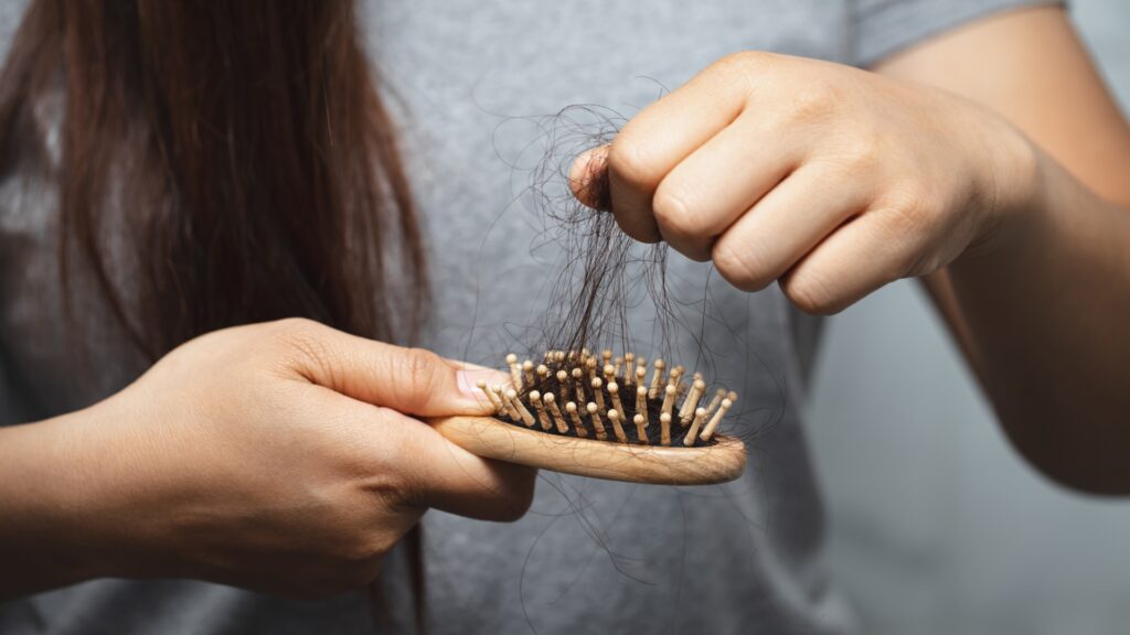 woman losing hair