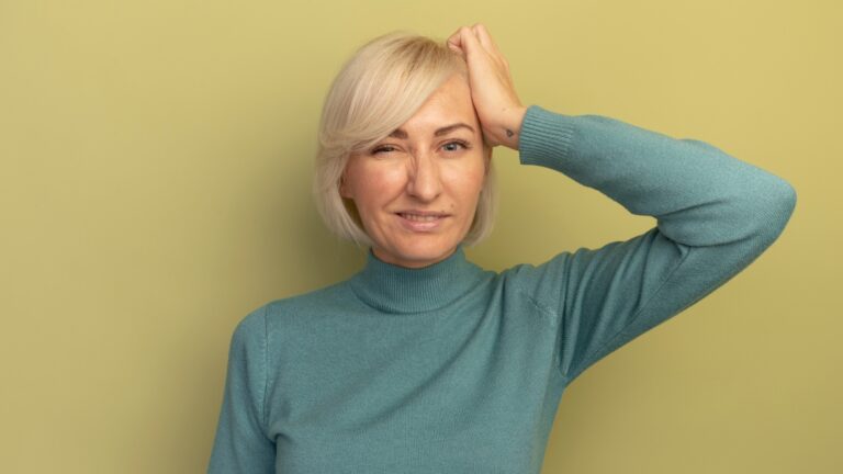A middle aged woman suffering from hair thinning