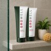 GroWell Shampoo and Conditioner in a shower